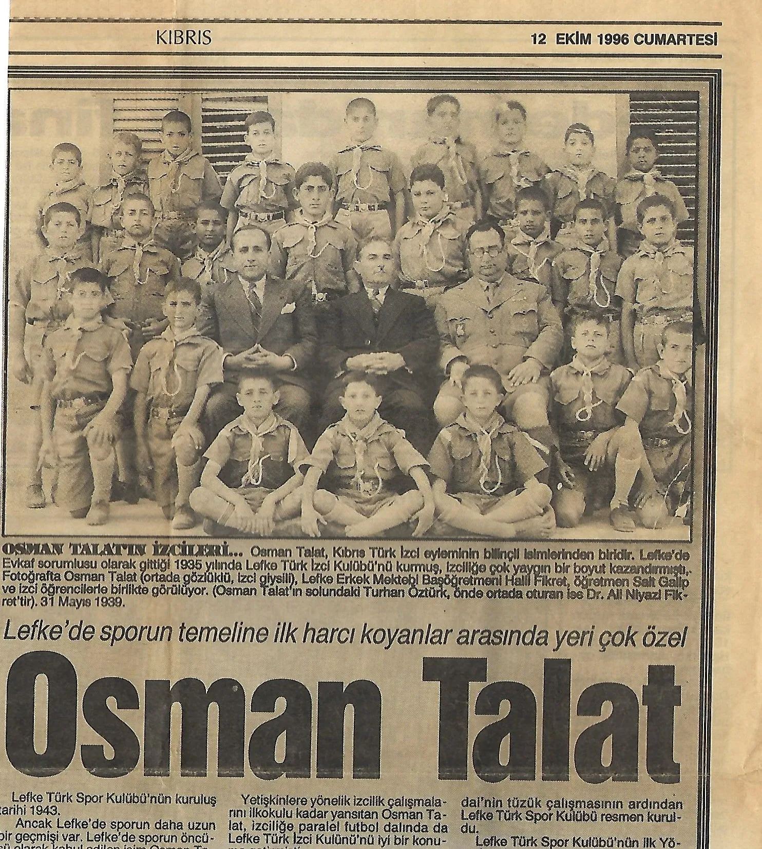 İkinci Sırada Ortada İzci Kıyafeti İle Gözlüklü Olan.